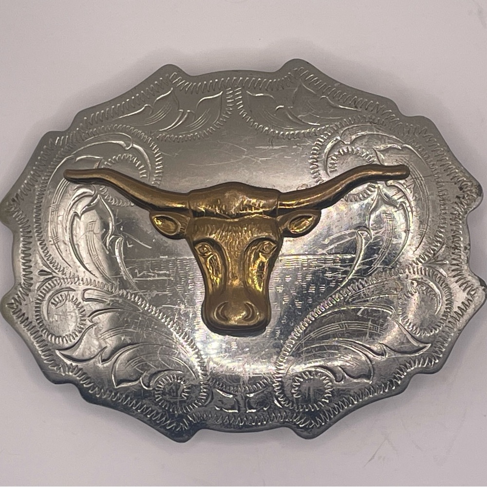 Vintage nickle silver with brass bull logo
